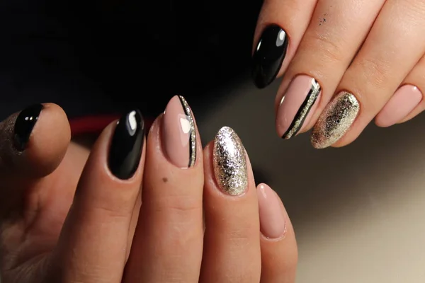 Design manicure black and beige nails with abstraction — Stock Photo, Image