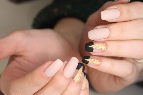 Perfect manicure and natural nails.