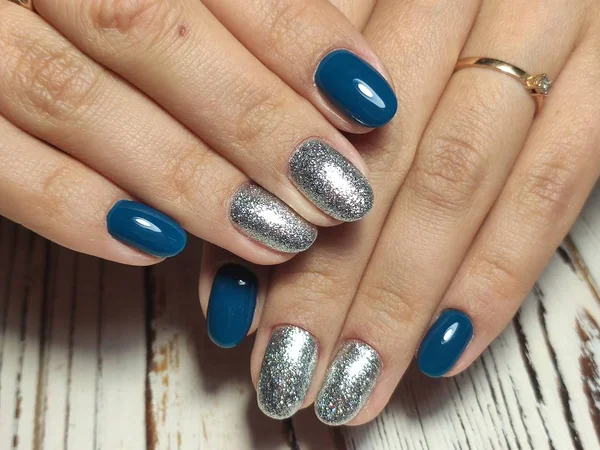 beautiful gel lacquer manicure on a textured trendy background