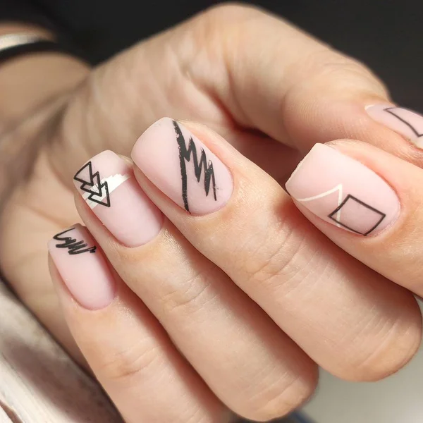 Gray striped nail design on female hand close up. — Stock Photo, Image