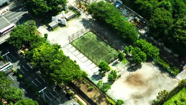 도쿄: 사람들 이 축구를 하는 것을 공중에서 바라본다. 4K 해상도의 시간이 줄어들고 있습니다. 신주쿠 2016 — 비디오