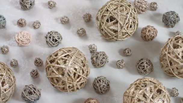 Christmas composition. Golden vine balls. 4K resolution dolly shot. Shallow depth of field. — Stock Video