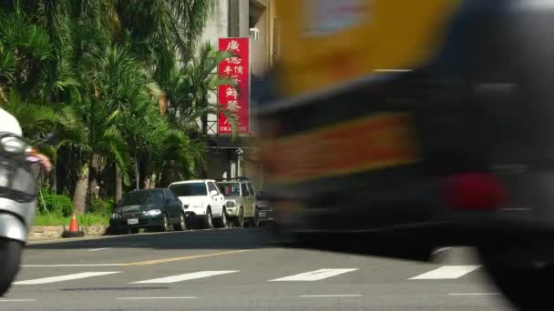 Zhongli District, Taoyuan City - Street view with signboards, traffic and people in sunny day. 4K resolution. — Stock Video