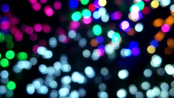 Colorful glowing lights. Bokeh background. — Stock Video