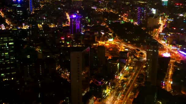 Nocny widok z lotu ptaka Ho Chi Minh City. Czas upływu rozdzielczości 4K. — Wideo stockowe
