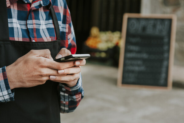 hand with mobile phone