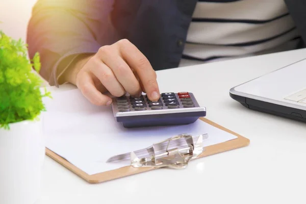 Hand with the calculator — Stock Photo, Image