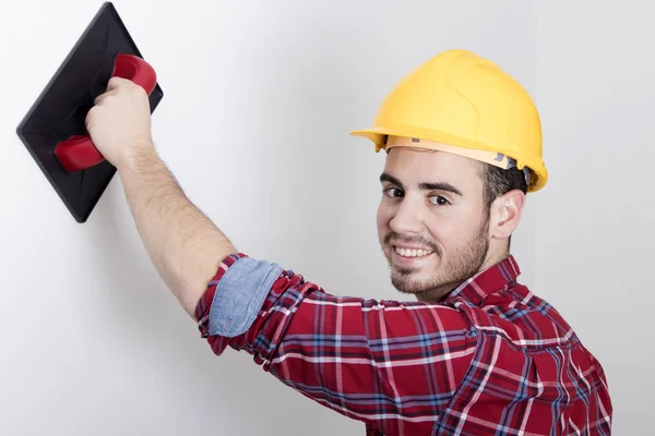 Trabajando en la pared —  Fotos de Stock