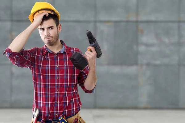 Builder drill thinking — Stock Photo, Image