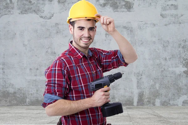 Bauarbeiter mit dem Bohrer — Stockfoto