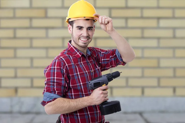 Construtor com a broca — Fotografia de Stock