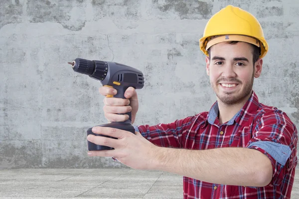 Builder med borren — Stockfoto