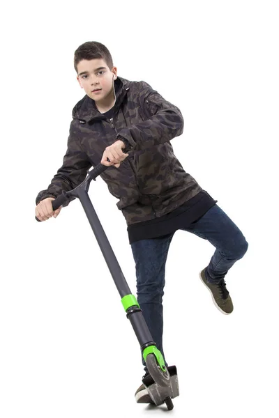 Criança com a scooter — Fotografia de Stock