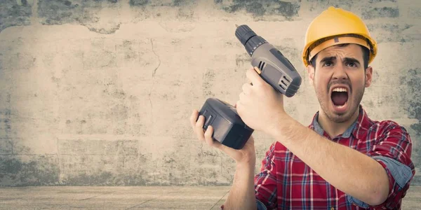 Worker with drill screaming — Stock Photo, Image