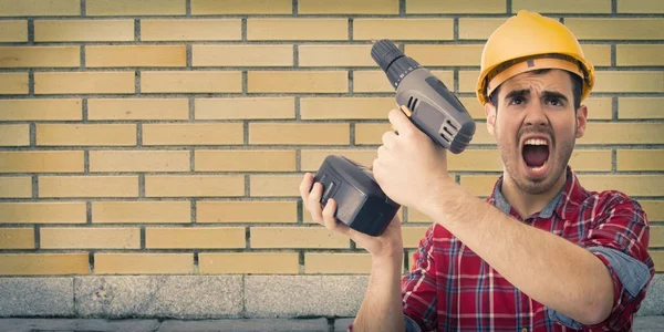Worker with drill screaming — Stock Photo, Image