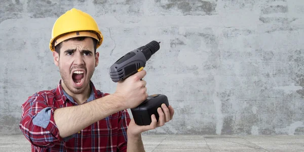 Trabalhador com broca gritando — Fotografia de Stock