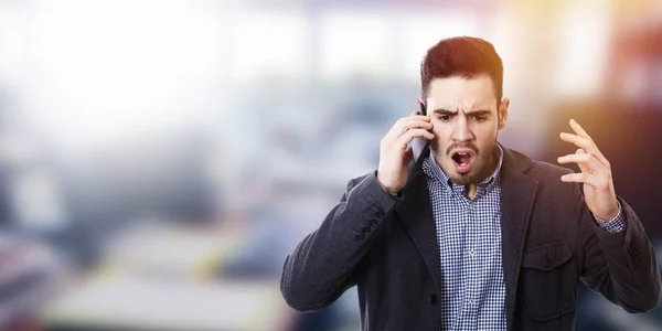 Affärsman med mobiltelefon — Stockfoto