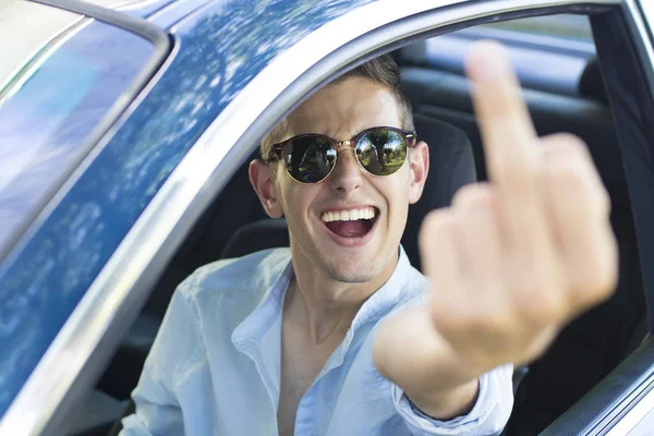 Young man in car — Stock Photo, Image