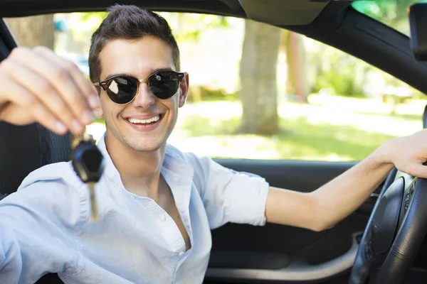 Man with the keys to the car — Stock Photo, Image