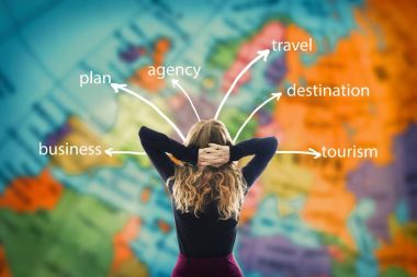woman with map and travel concepts clipart