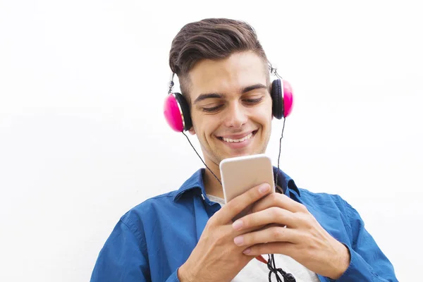 Νεαρός Έφηβος Μοντέρνα Τηλέφωνο Και Ακουστικά Ακούτε Μουσική — Φωτογραφία Αρχείου