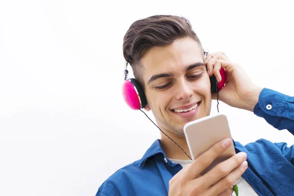 Jonge Moderne Tiener Met Telefoon Hoofdtelefoon Luisteren Naar Muziek — Stockfoto