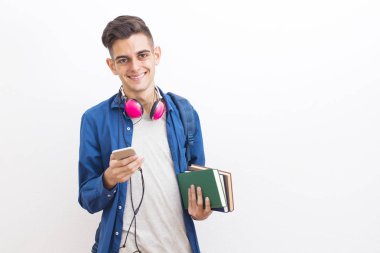 cep telefonu ve kitaplar ile ergen öğrenci üniversite