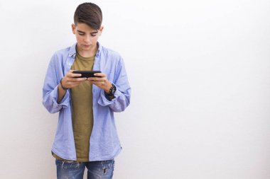 young teenager with blank cell phone isolated clipart