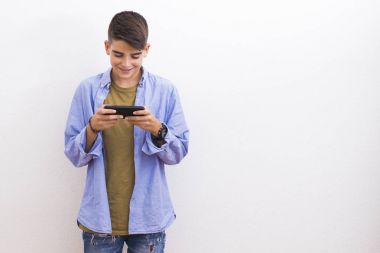 young teenager with blank cell phone isolated clipart
