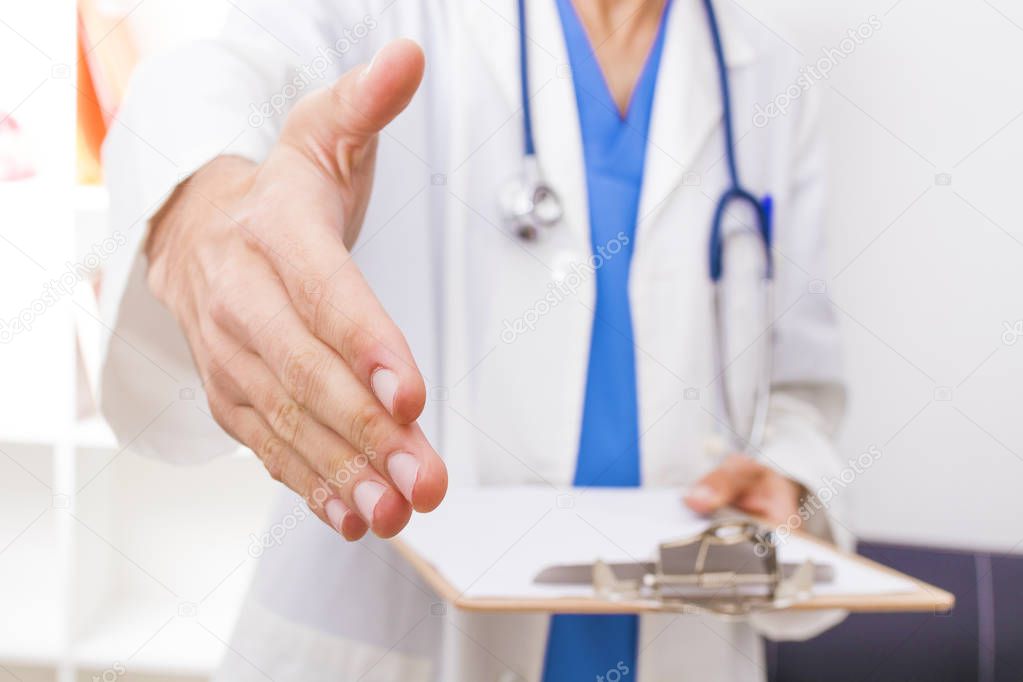 doctor greeting, doctor waving with the extended hand