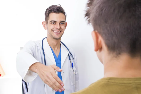 family doctor with patient in consultation