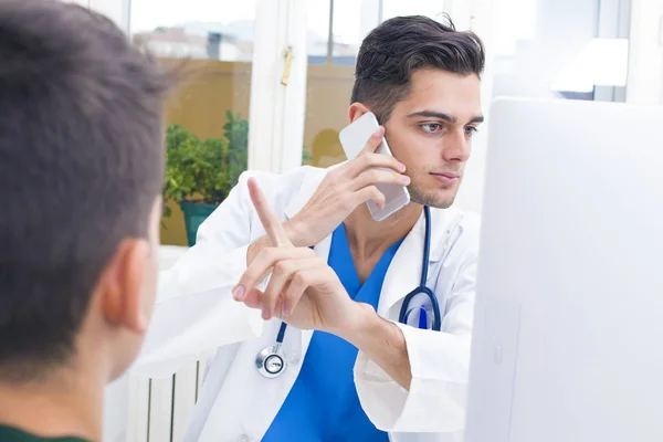 doctor with patient in consultation