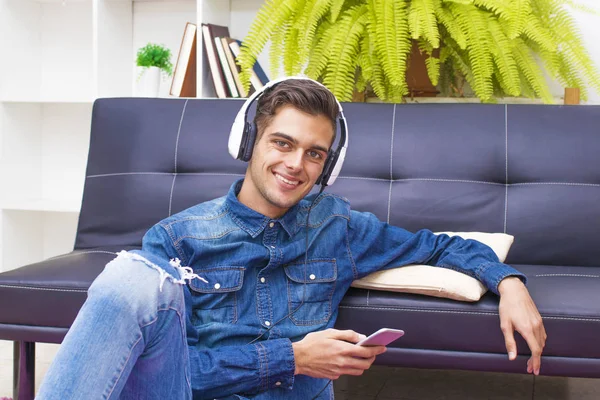Young Teenager Mobile Phone Headphones Home — Stock Photo, Image