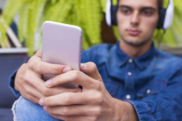 Young Man Listening Music Home Lounge Phone Earphones — Stock Photo, Image