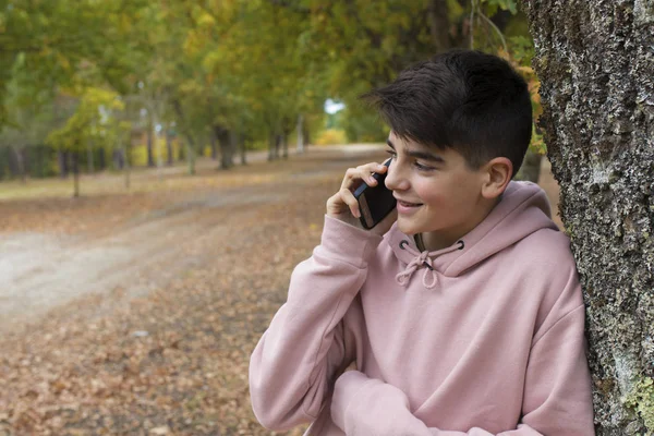 Teenager Talking Mobile Phone Outdoors Autumn — Stock Photo, Image