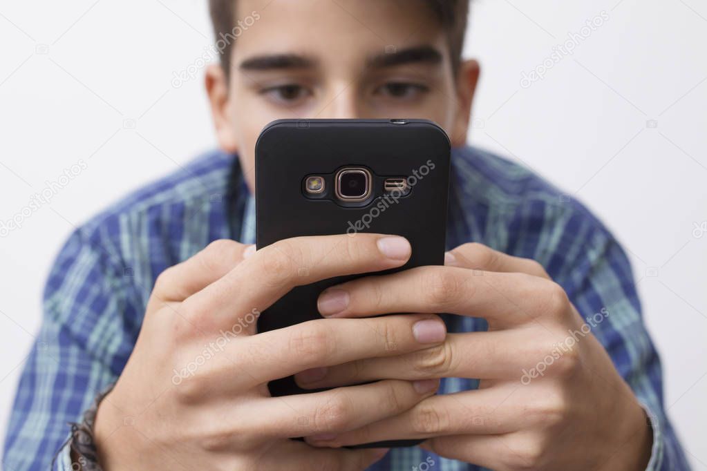 child, teenager or preteen with mobile phone