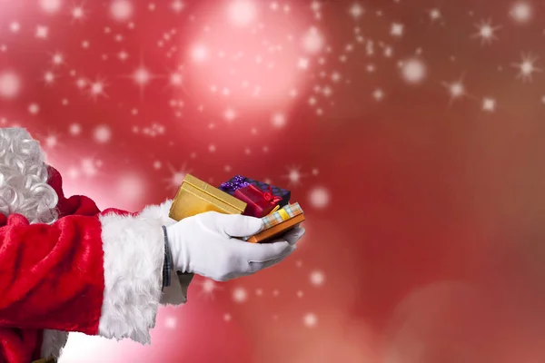 Santa Claus Lub Papa Noel Ręce Pełne Prezenty Świąteczne — Zdjęcie stockowe