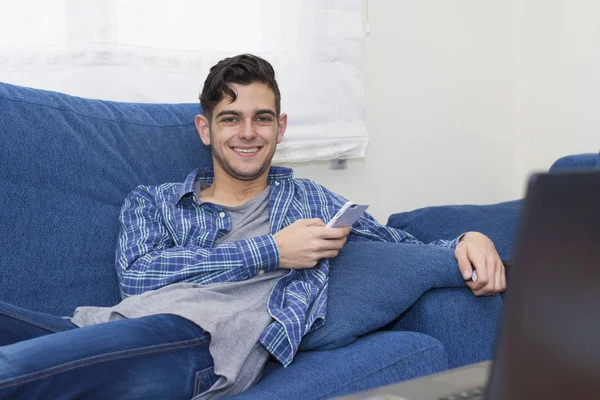 Young Home Mobile Phone Couch — Stock Photo, Image