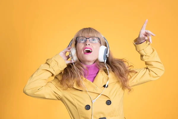 Adult Woman Headphones Dancing Color Background — Stockfoto