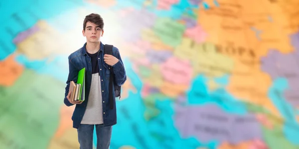 student with backpack and books on map background