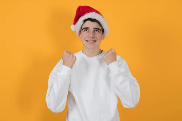Young Man Santa Claus Hat Isolated Color Background — Stock Photo, Image