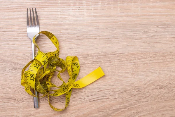 带卷尺的叉子 饮食和减肥概念 — 图库照片