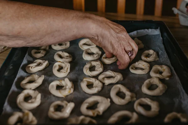 woman hands preparing traditional cakes and sweets