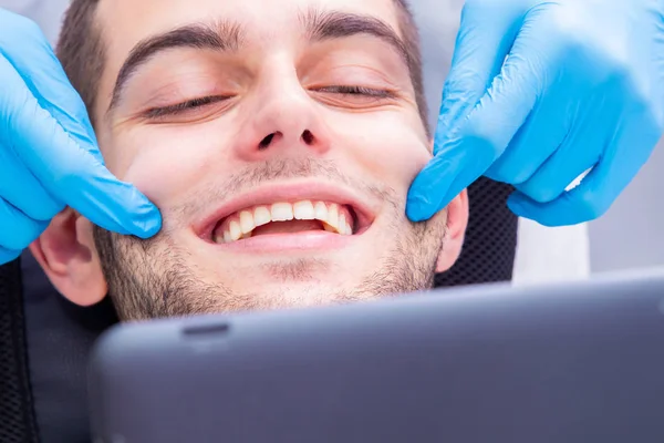 Dentist Showing Patient Smile Teeth — 스톡 사진