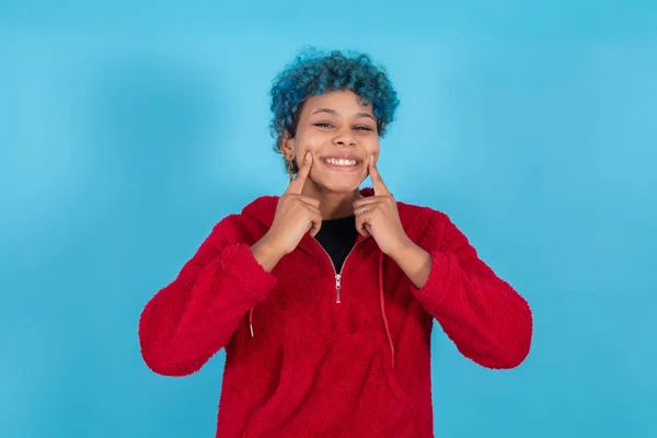 Young Girl Hands Her Mouth Showing Smile Isolated Blue Background — ストック写真
