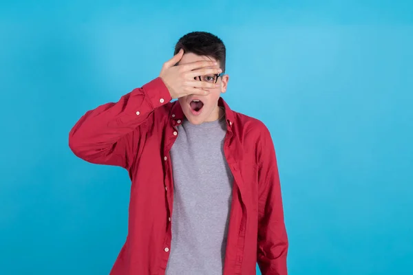 Young Teenage Man Isolated Color Background Eye Covered — 스톡 사진