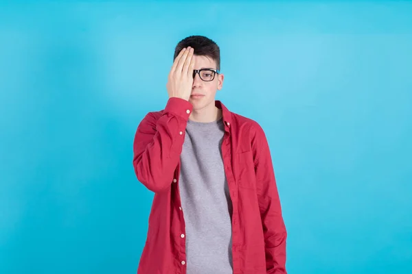 Young Teenage Boy Covered Eye Isolated Background — 스톡 사진