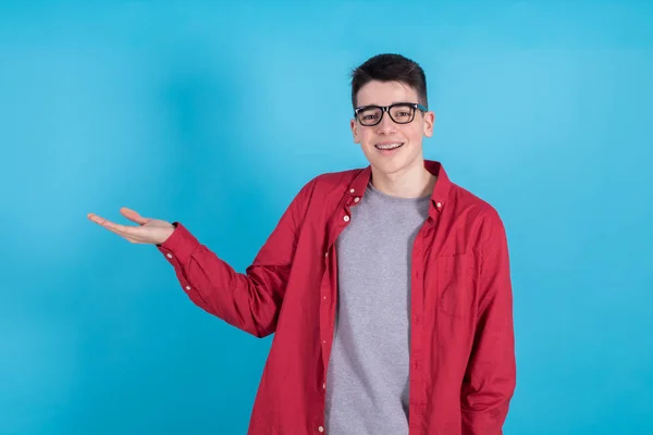 Young Teenage Man Smiling Pointing Isolated Color Background — 图库照片