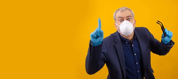 businessman with infection protection sanitary mask isolated on background