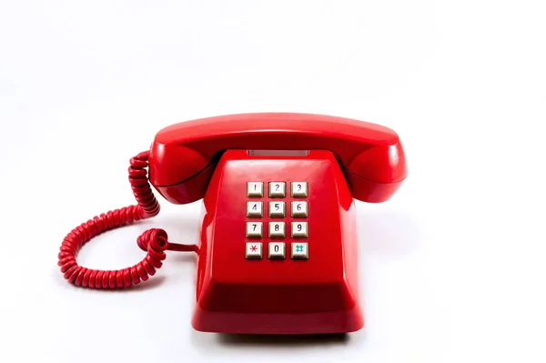 Красный винтажный телефон — стоковое фото